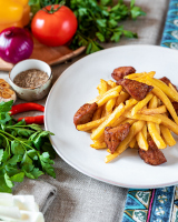 Картофель жаренный с мясом и грибами