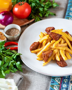 Картофель жаренный с мясом и грибами